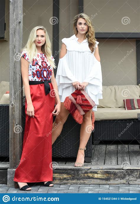 two beautiful blonde fashion models during a photoshoot