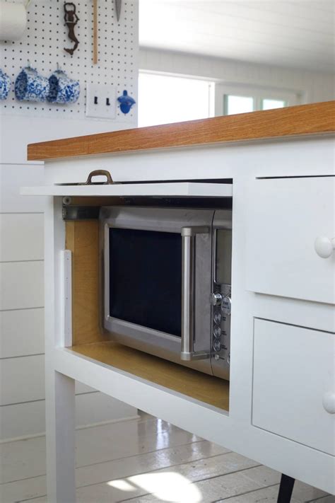 11 Strategies For Hiding The Microwave Remodelista Hidden Microwave