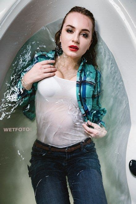 wetlook by seductive girl in soaking wet skinny jeans and pantyhose