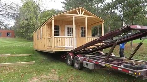 amish workshop tiny house delivery    hydraulic trailer youtube
