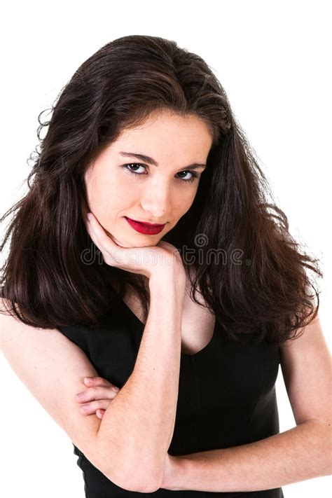 pretty teenage girl with braces in red dress smiling stock