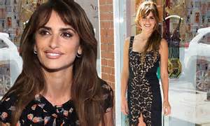 penelope cruz swaps one patterned black dress for another