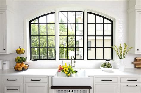 arch casement windows  farmhouse sink transitional kitchen