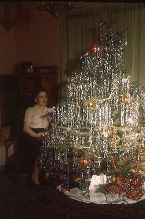 mid century women enjoying real christmas trees