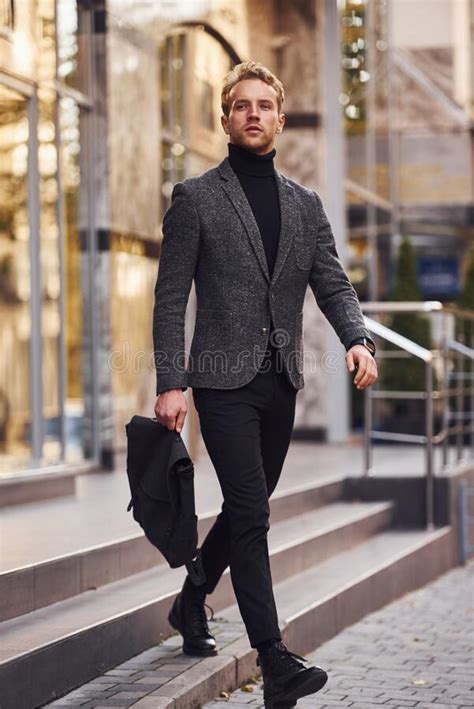 man  elegant formal wear   bag    modern
