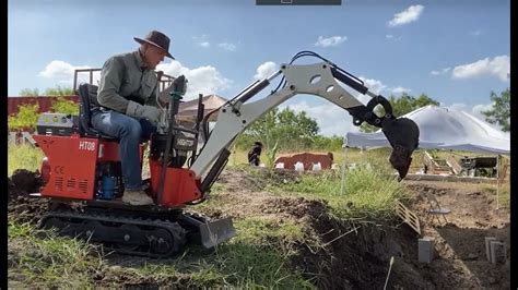 root cellar dig  mini excavator  filling earth bags ep  part  youtube