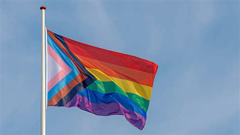 the history of the lgbtq pride flag from the og rainbow to progress pride