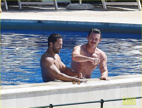 Luke Evans Shows Off His Shirtless Body In The Pool With