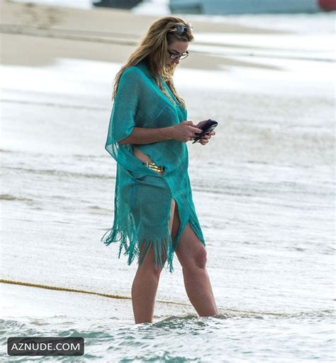 claire sweeney dons her teal and gold bikini out in the