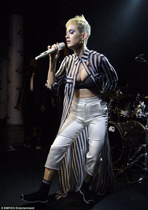 Katy Perry Flashes Her Pants In A Low Cut Silver Dress