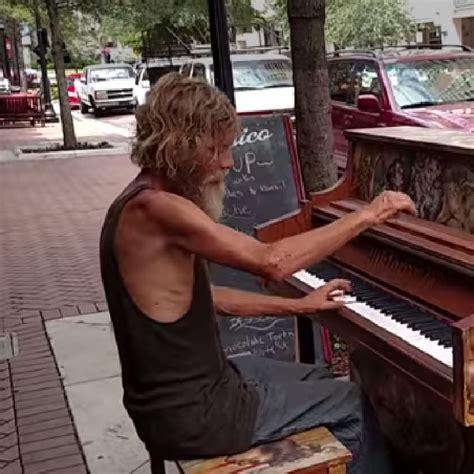 homeless man plays the piano so beautifully
