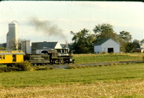 strasburg railroad      locomotive yellow passenger car