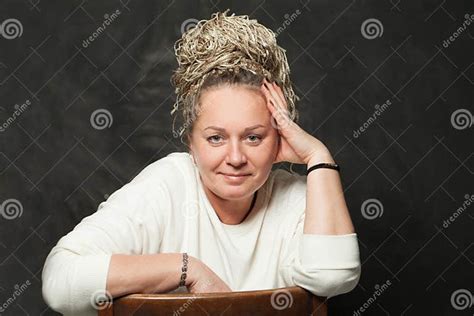 Cute Mature Woman Smiling Portrait On Black Background Stock Image
