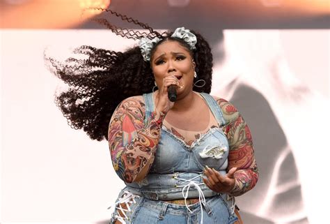 lizzo lawsuit postmates driver  lizzo blasted  suing