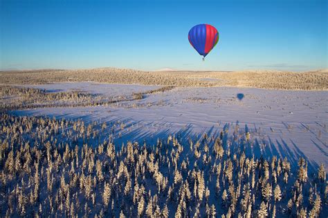 northern lights   hot air balloon  swedish lapland lonely planet