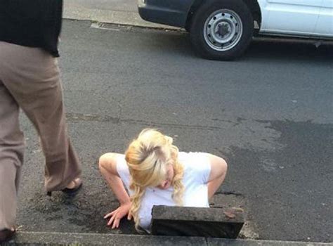 teenager gets stuck in a drain while trying to retrieve her smartphone