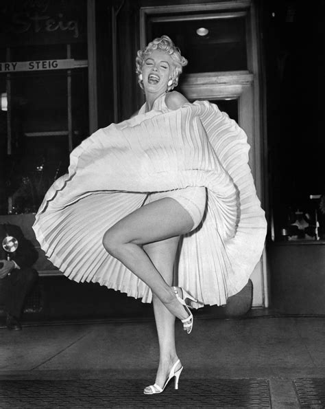 behind the scenes of marilyn monroe s iconic flying skirt photo while