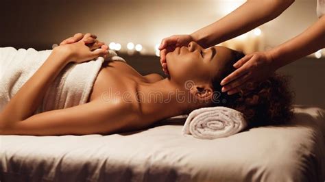 African American Woman Getting Massage In Spa Stock Image