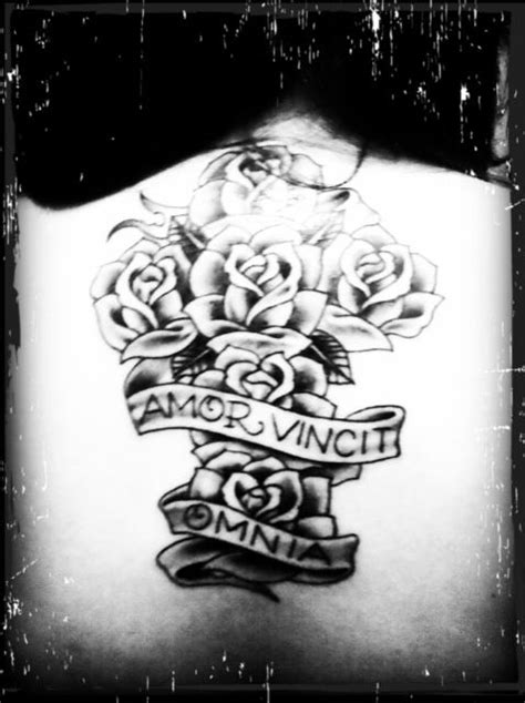 this is my back tattoo latin for love conquers all things ♥ back tattoo tattoos love
