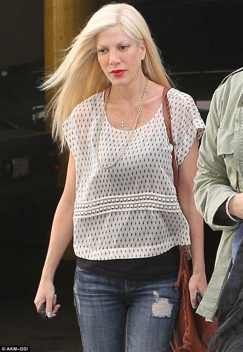 Tori Spelling Looks Downcast As She Displays Thin Frame In Skinny Jeans
