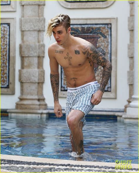 justin bieber goes shirtless for a swim at the versace mansion photo 3528463 justin bieber