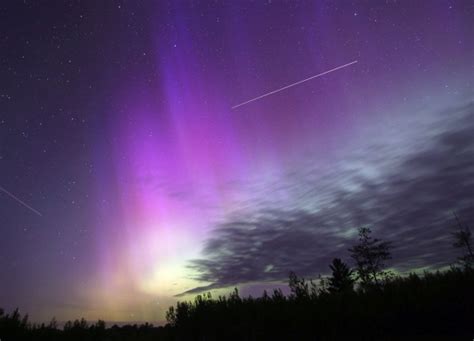 real colorful aurora borealis from space and northern