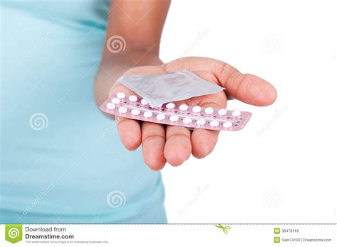 black african american woman holding contraceptive