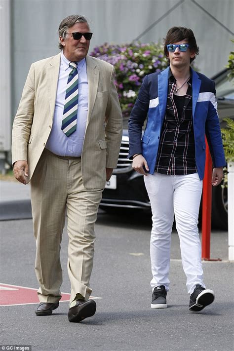 stephen fry joins husband elliot spencer out at wimbledon daily mail