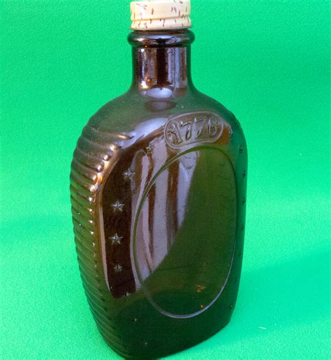 log cabin syrup bicentennial brown bottle   eagle design