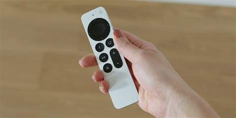 apple unveils redesigned  apple tv remote  physical buttons  glass tomac
