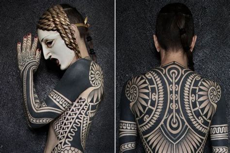 Woman Covered From Head To Toe In Huge Intricate Tribal