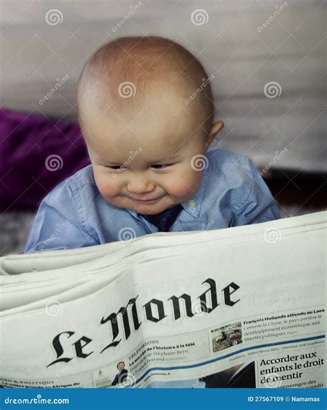 child reading le monde newspaper editorial stock image image