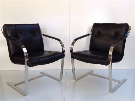 Pair Of Polished Stainless Steel And Leather Chairs By Brueton At 1stdibs