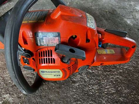 husqvarna  chainsaw  primer pump fragodt auction  real estate llc