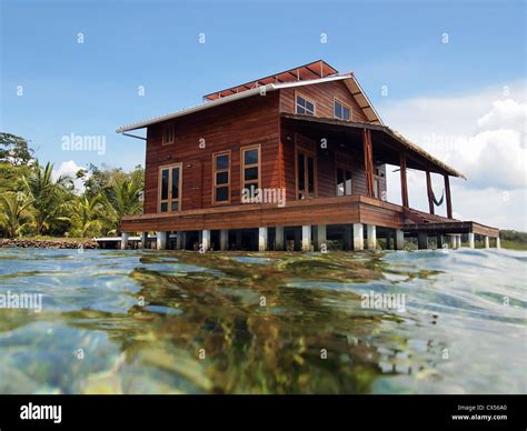 tropical stilt house   caribbean sea stock photo alamy