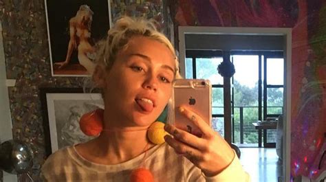 liam hemsworth is officially back on miley cyrus instagram