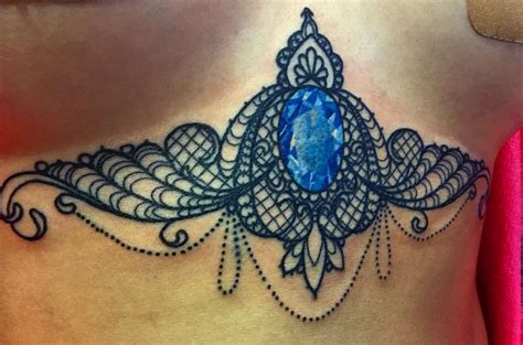 womans stomach   blue stone   shape   peacock