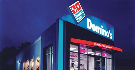 dominos plans  grow  size   percent    years nations restaurant news