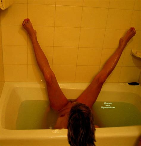 Brunette Naked In The Tub Sideways With Legs On Wall November 2007