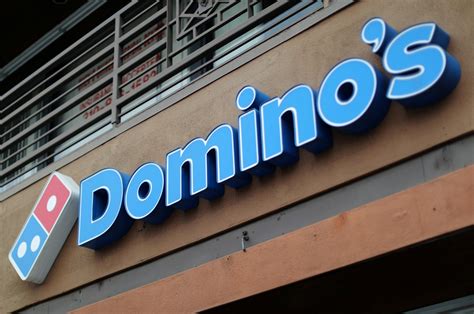 dominos misses sales profits estimates  delivery competition heats
