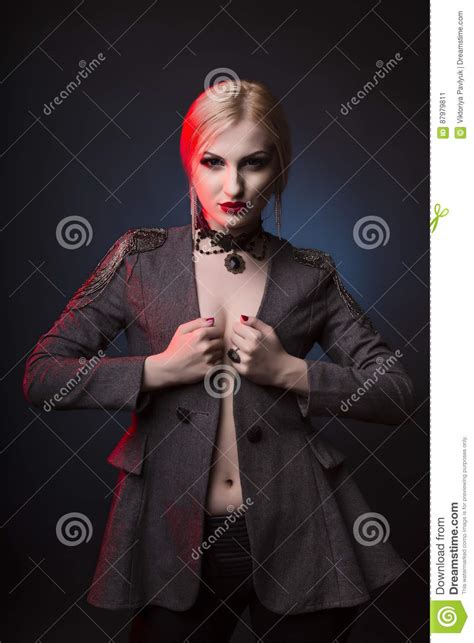 Blonde Woman With Decollete And Bright Evening Makeup Stock Image
