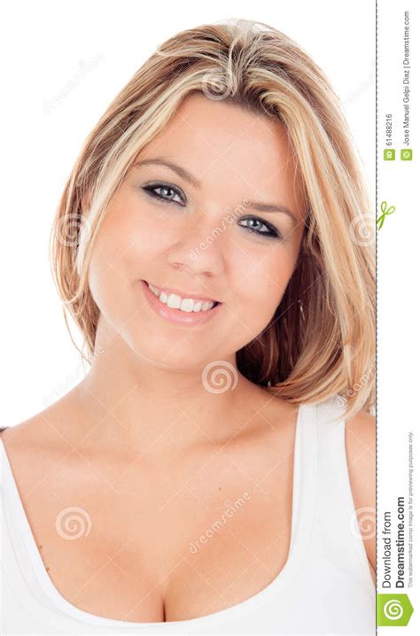 cute blonde girl with blue eyes looking at camera stock
