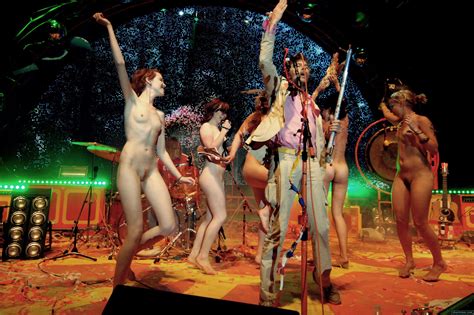 flaming lips with naked ladies on stage during a nudeshots