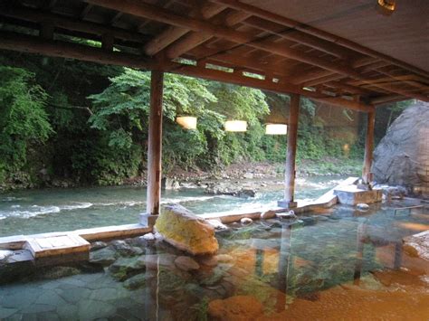 watch the clear stream of shima river from the giant open air bath at gunma s shima yamaguchikan