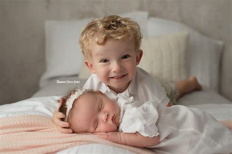 siblings enjoy  newborn photoshoot shannon reece jones