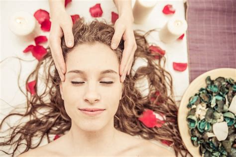 premium photo head massage young woman making massage   spa