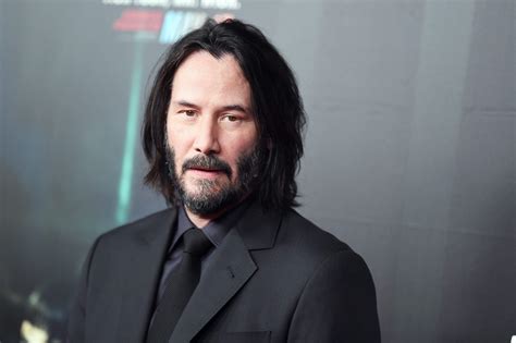 keanu reeves takes  chances     posing  pictures