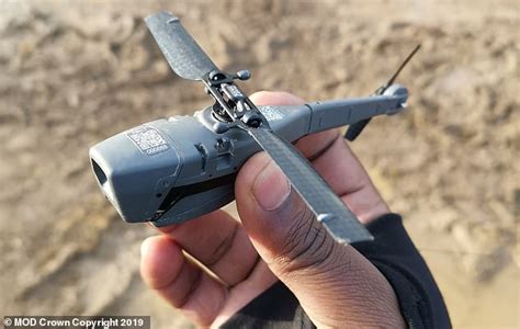uk troops    palm sized drones  monitor enemies   battlefield daily mail