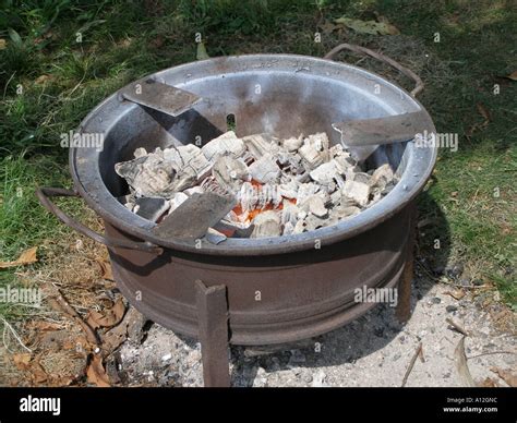 lighted charcoal stove stock photo alamy
