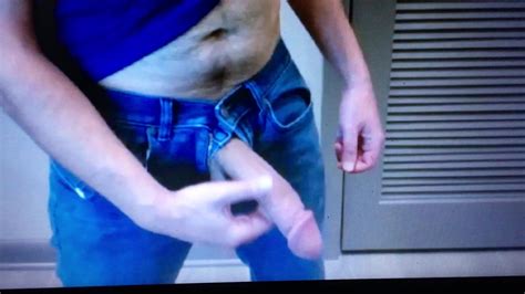 huge hung in jeans shows off his hard dick hanging out